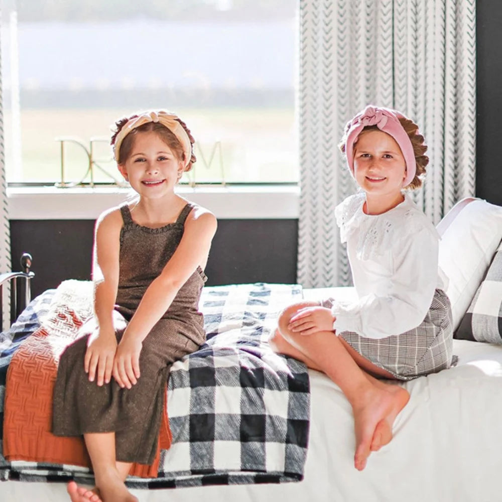 Cxbfg heatless hair curling rod in use, showcasing soft, bouncy curls on long hair without heat damage.