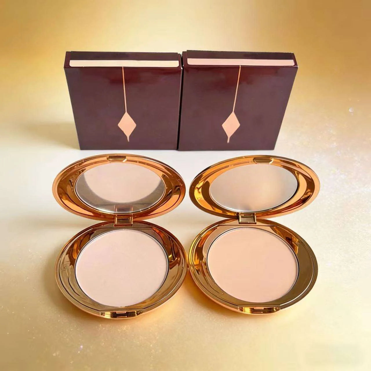 FIX IT GURL! translucent setting powder and concealer in a compact, showcasing the smooth texture and full coverage formula.