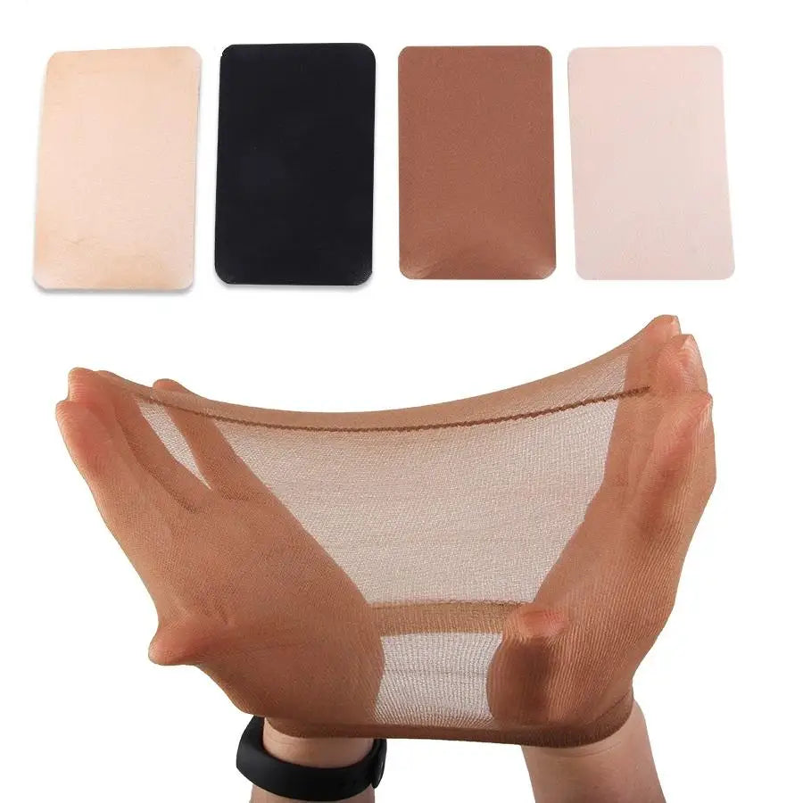 Black nylon wig cap for women, ventilated design by DoubleMfashion, ideal for hair styling and wig making.