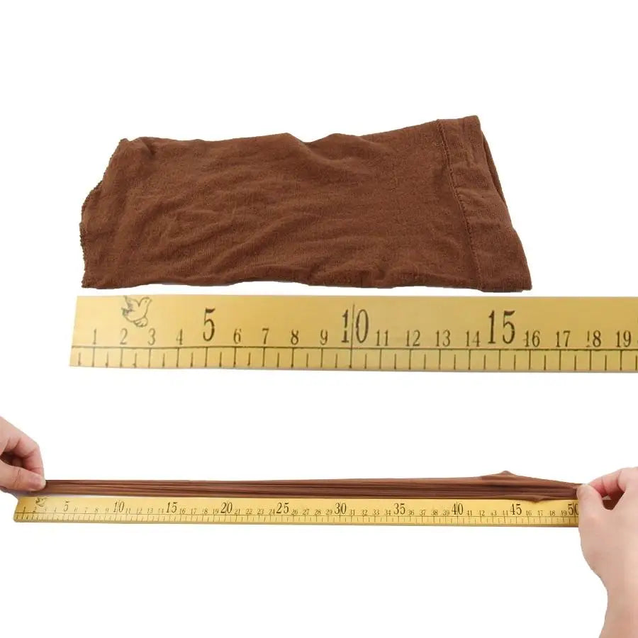 Black nylon wig cap by DoubleMfashion, ventilated design for comfortable wig making and styling for women.