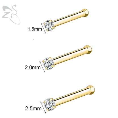 Gold stainless steel nose stud set with heart, star, and round crystal designs in L shape for nostril piercing.