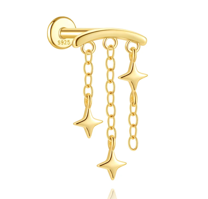 CANNER 925 Sterling Silver eight-pointed star CZ earring with tassel chain, designed for women, showcased on a model.