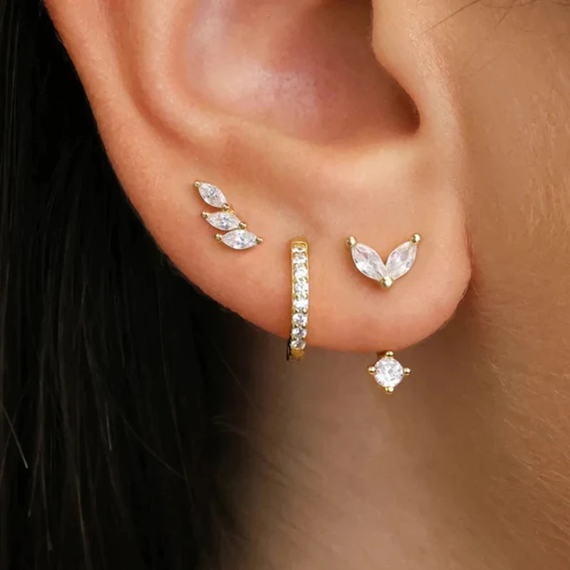 3PCS gold stainless steel hoop earrings set with zircon flower studs for women, featuring a cartilage piercing design.