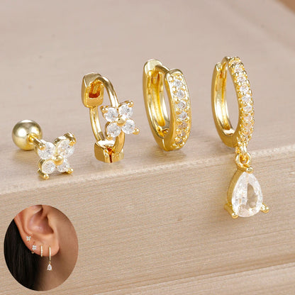 Set of 4 small hoop earrings featuring zircon star, moon, and flower designs by DoubleMfashion in stainless steel.