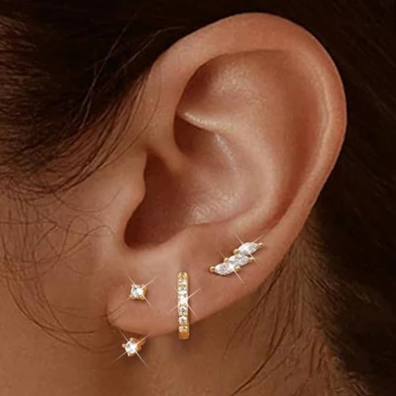 Set of 3 stainless steel gold hoop earrings with zircon flower studs, perfect for women’s cartilage piercing jewelry.