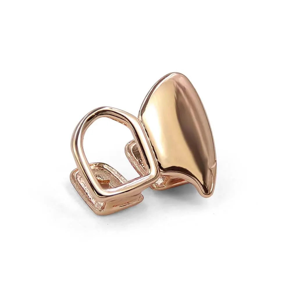 TOPGRILLZ glossy double hollow teeth grillz fangs set for Halloween, featuring top and bottom dental grills in a stylish design.