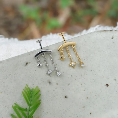 CANNER 925 sterling silver eight-pointed star CZ earring with tassel chain, perfect for women's party jewelry.