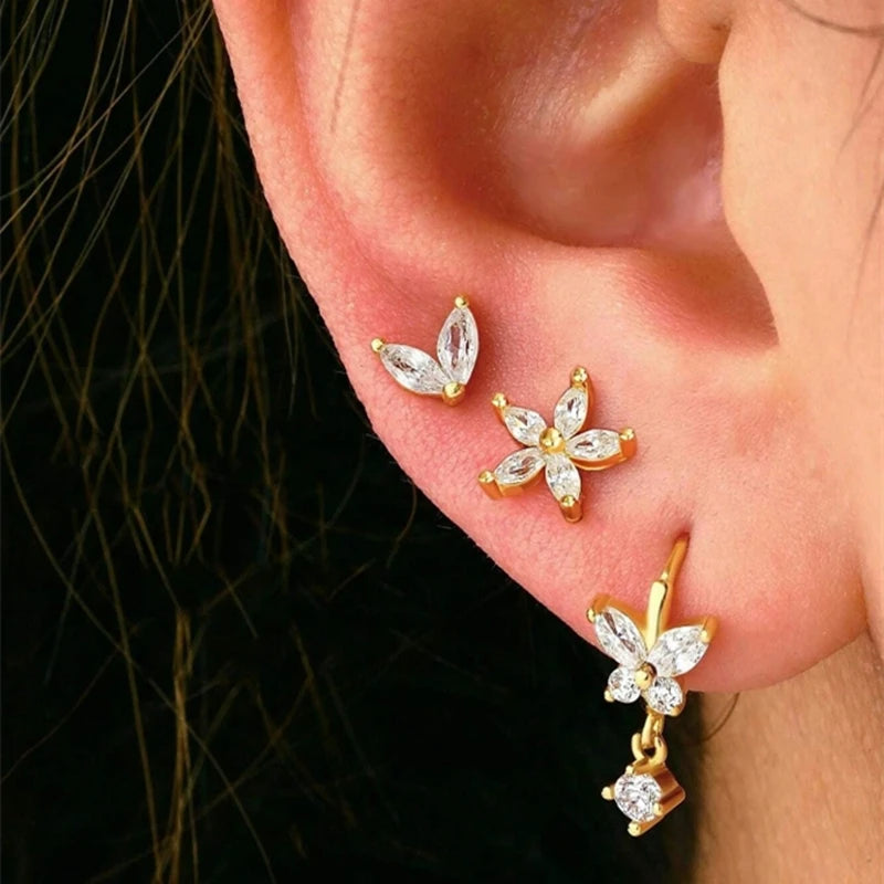 3PCS stainless steel gold circle hoop earrings set with zircon flower stud earrings for women, showcasing elegant design.