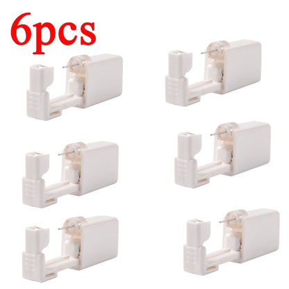 Disposable ear piercing gun kit by DoubleMfashion, showcasing multiple safety earring piercers and body jewelry tools.