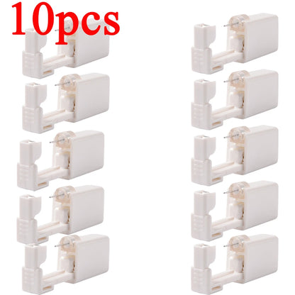 Disposable ear piercing gun kit by DoubleMfashion with studs and nose ring, showcasing the piercing machine and tools.