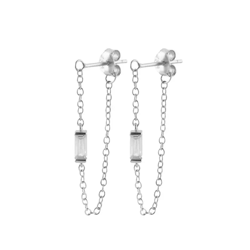 Minimalist 925 sterling silver crystal stud earrings for women, showcasing a sleek design perfect for parties and luxury occasions.