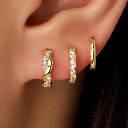 Set of 3 stainless steel gold hoop earrings with zircon flower studs for women, featuring simple and elegant designs.