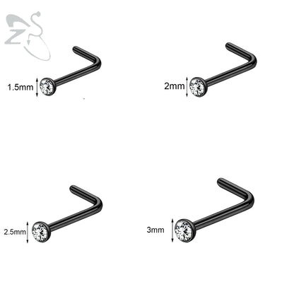 Gold stainless steel nose stud set by DoubleMfashion featuring heart, star, and round crystal designs in L-shape.