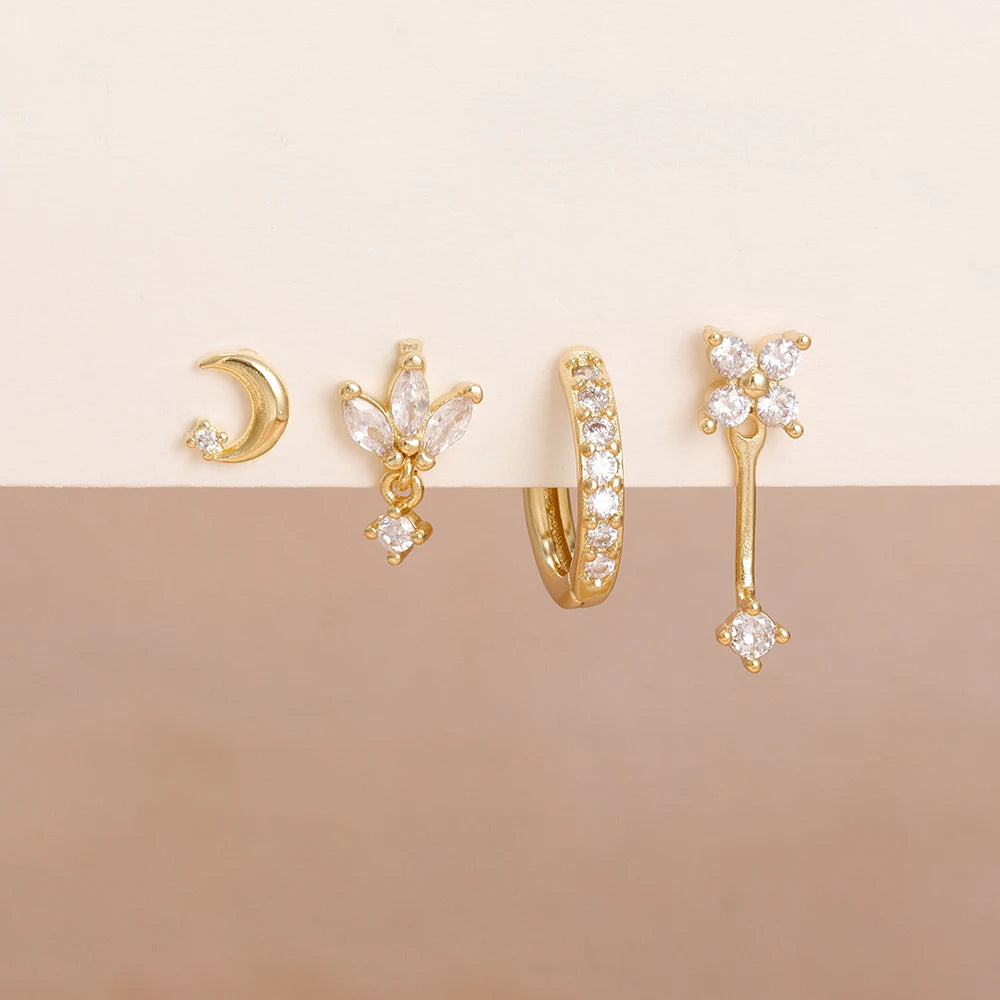 4PCS stainless steel hoop earrings set featuring star, moon, and flower designs for women by DoubleMfashion.