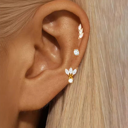 3PCS gold color stainless steel circle hoop earrings set with zircon flower studs and cartilage piercing for women.