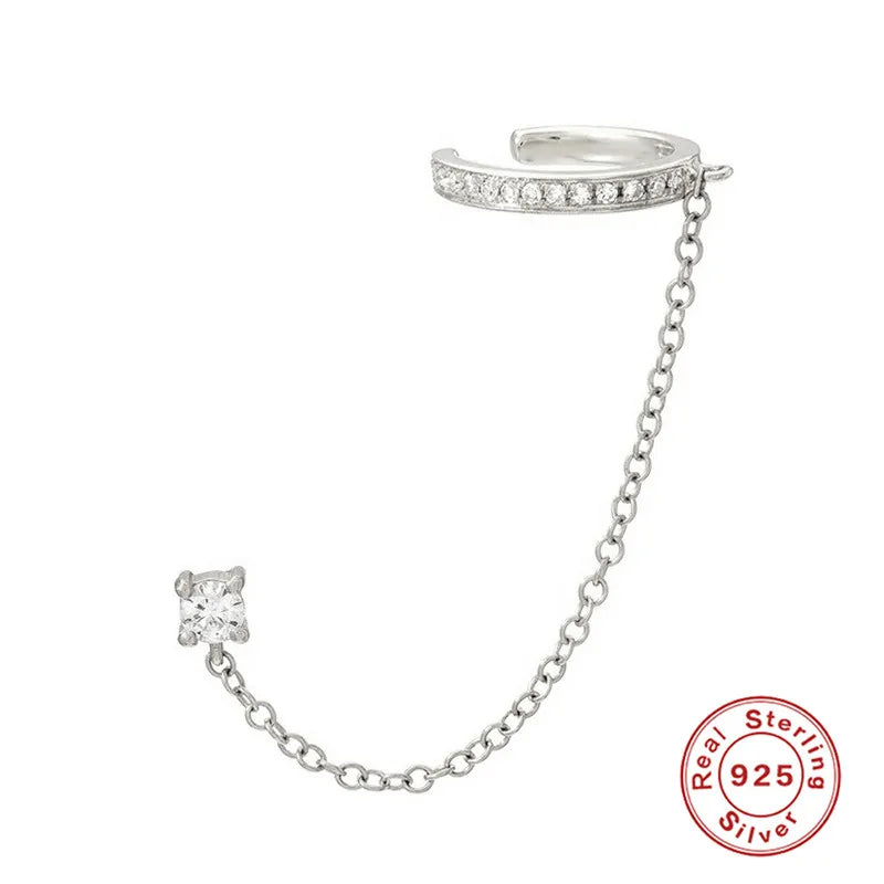 CANNER 925 Sterling Silver eight-pointed star CZ piercing earring with tassel chain for women, fine jewelry detail.