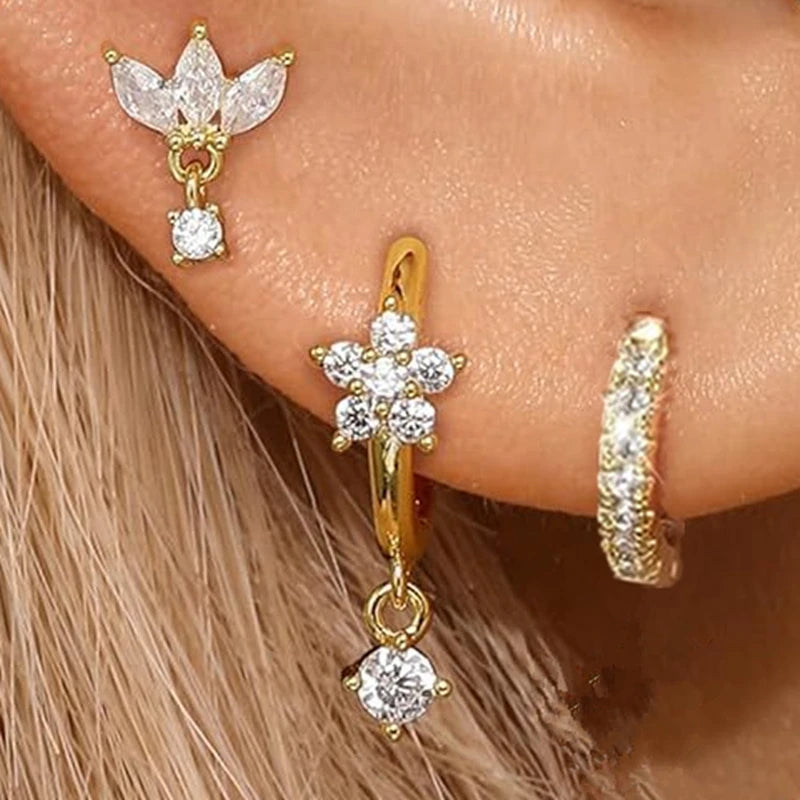 3PCS gold color stainless steel hoop earrings with zircon flower studs for women, featuring simple and elegant design.