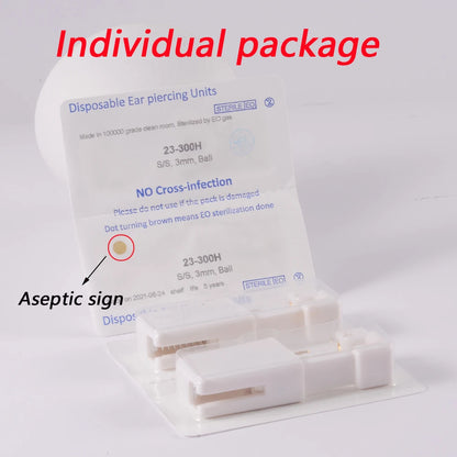 Disposable ear piercing gun kit by DoubleMfashion with studs and nose ring body jewelry tools.